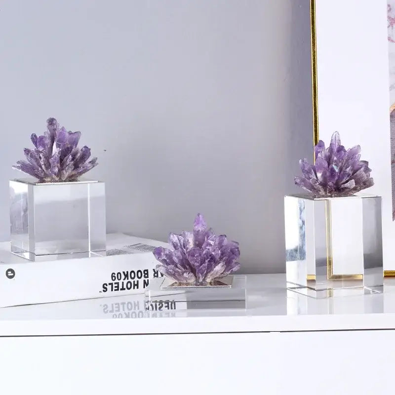 Purple amethyst crystal clusters displayed on clear acrylic bases as agate stone crystal sculpture for living room decorbites