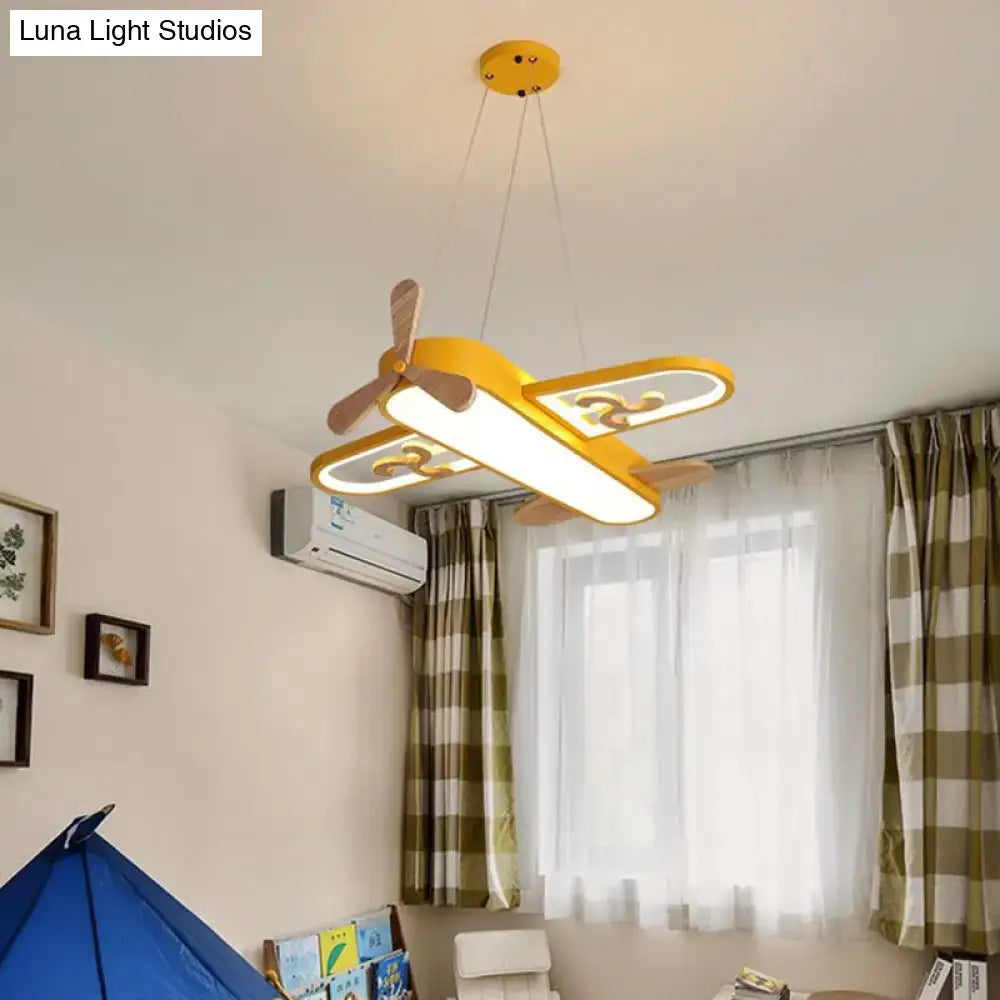 Yellow airplane-shaped pendant light with wooden propeller and wings featuring remote control stepless dimming perfect addition