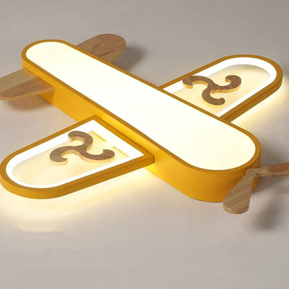 Yellow airplane-shaped decorbites led wood ceiling light with wooden accents and illuminated wings for kids bedroom