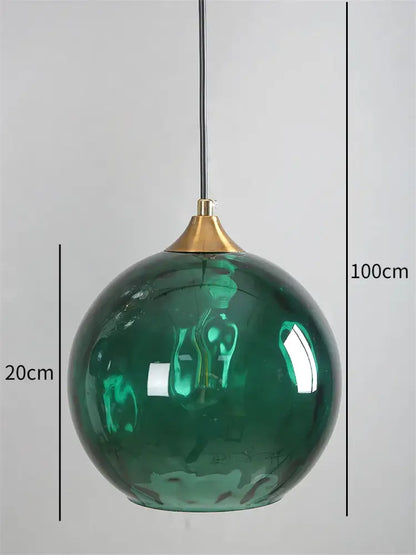 Emerald green glass ball pendant with brass top and black cord from decorbites glass ball pendant led chandelier collection