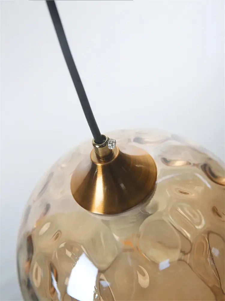 Amber textured glass ball pendant led chandelier with brass base and black cord for kitchen decorbites glass ball pendant