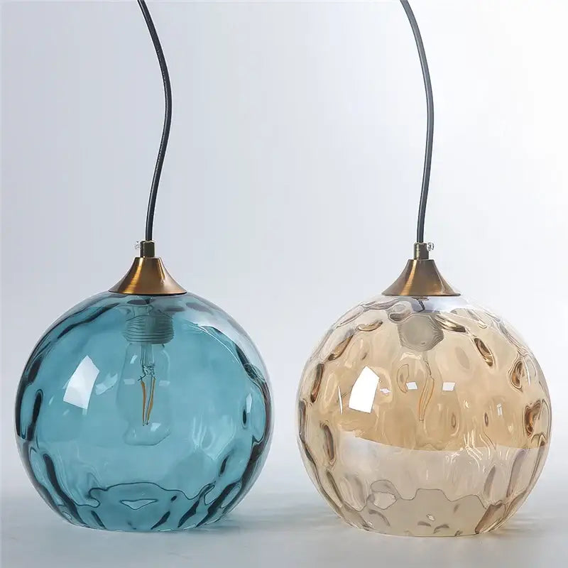 Two decorbites glass ball pendant lights in translucent blue and amber textured glass ball pendant led chandelier