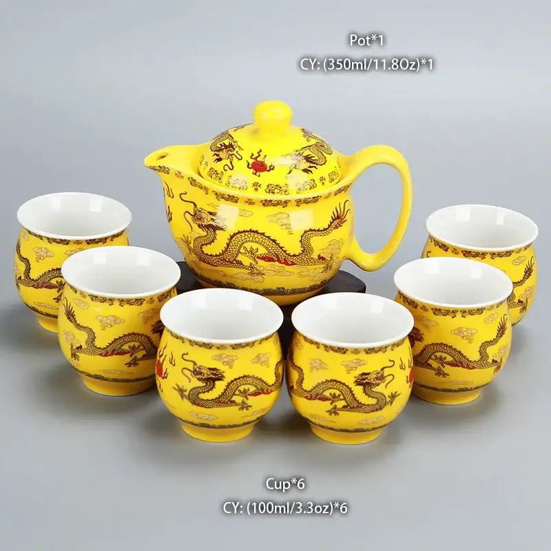 Vibrant yellow ceramic tea set with intricate gold and red dragon motifs by Decorbites dragon teapot for elegant tea decor