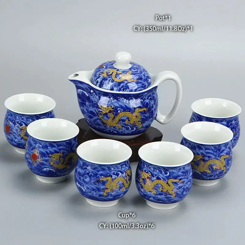 Blue and gold dragon teapot tea set featuring porcelain ceramic decorbites dragon teapot with white handles and six cups