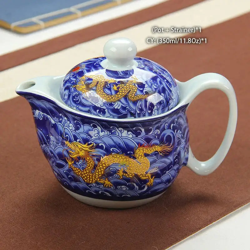 Blue and gold ceramic dragon teapot with matching strainer from decorbites tea set for elegant dragon teapot tea service