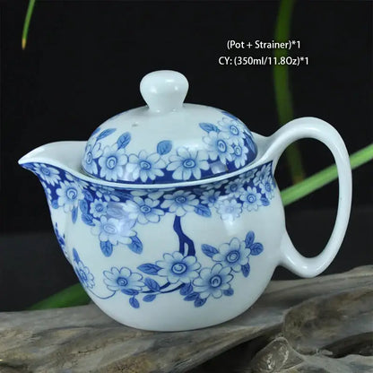 White ceramic dragon teapot tea set with blue floral pattern and curved spout by decorbites for dining room teaware