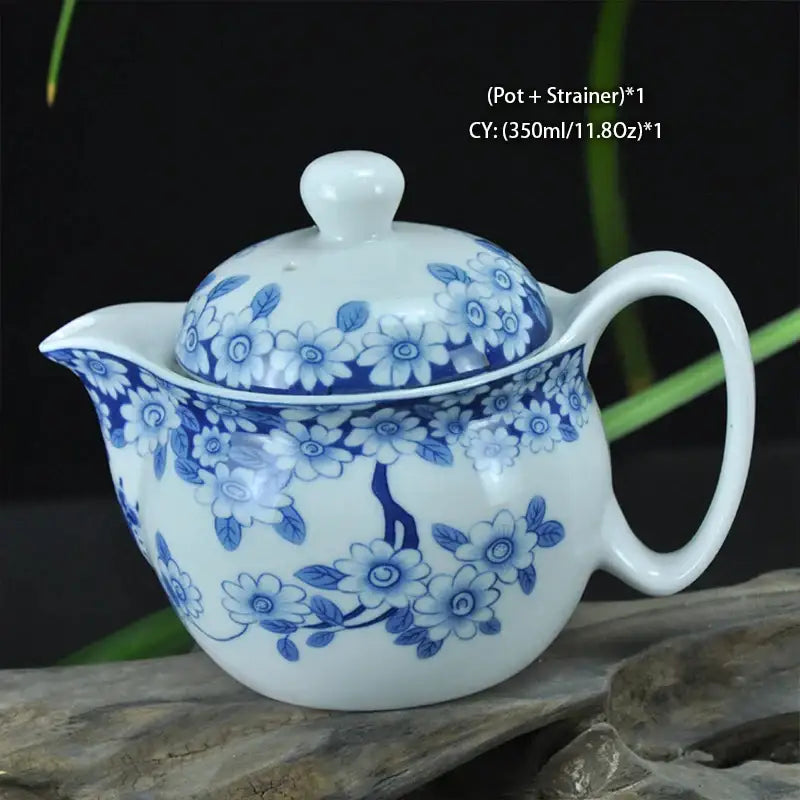 White ceramic dragon teapot tea set with blue floral pattern and curved spout by decorbites for dining room teaware