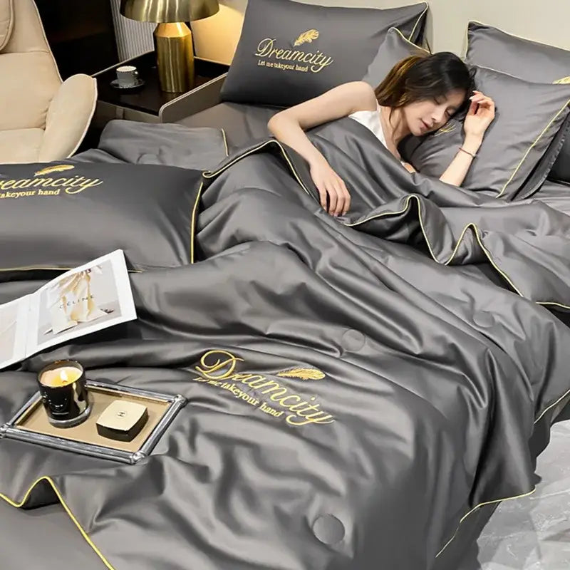 Luxurious dark gray satin quilt set with gold embroidered ice silk piping for ice silk summer bedroom use