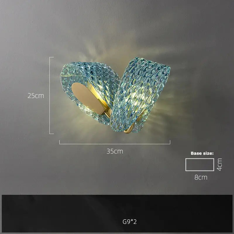 Blue textured glass wall sconce with gold-toned metal base featured in decorbites g9 led copper pendant light design