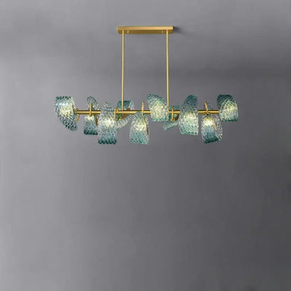 A modern blue and gold petal glass led copper pendant light with teal shades for dining room decorbites g9 led