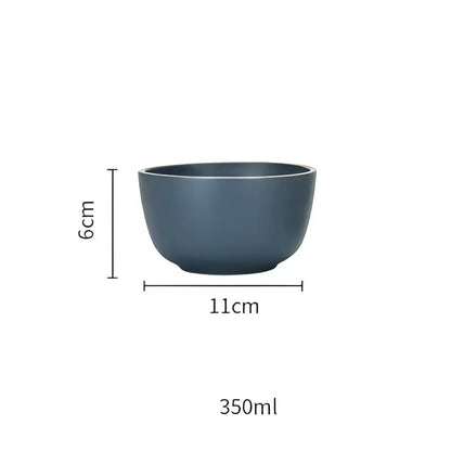 A sleek matte dark blue ceramic morandi bowl with smooth rounded rim and sturdy base from decorbites ceramic dinnerware