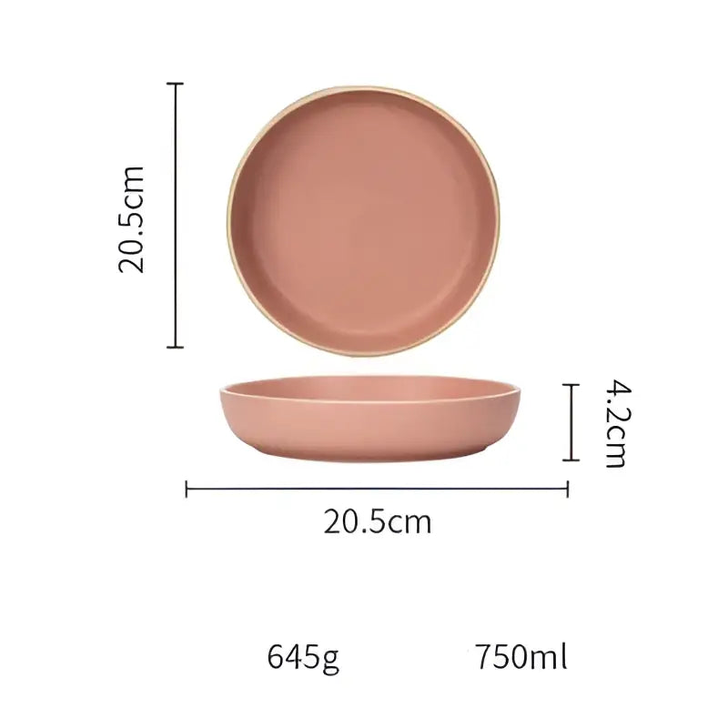 A sleek matte pink decorbites ceramic morandi bowl with gold rim and rounded edges for elegant dining room decor