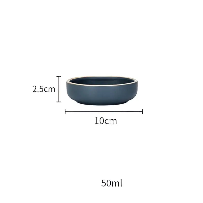 A sleek dark blue ceramic morandi bowl with smooth glossy finish and rounded edges from decorbites ceramic dinnerware