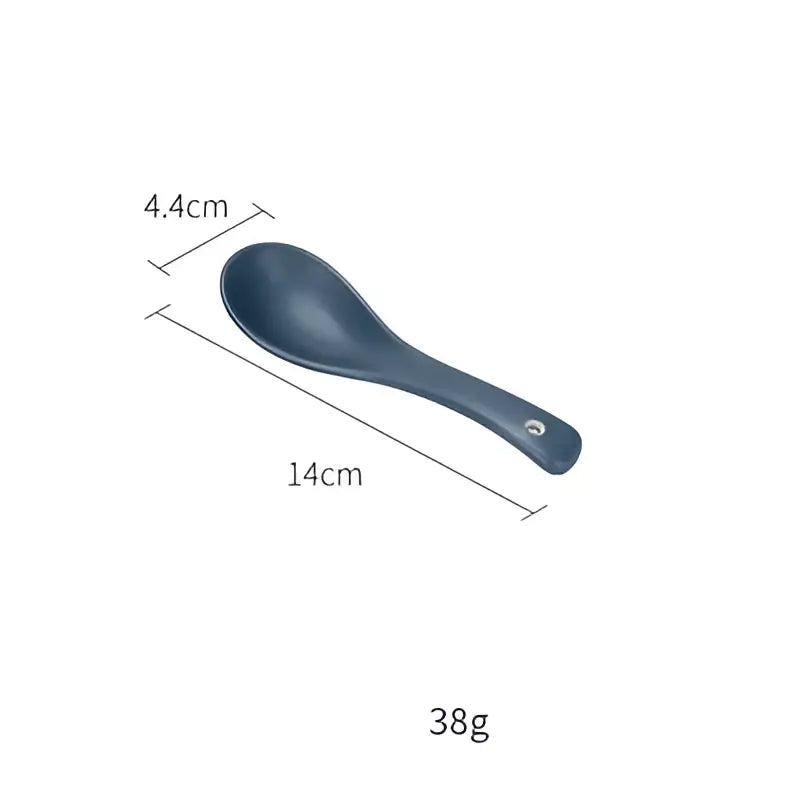 Dark blue ceramic spoon with smooth glossy finish and subtle rounded handle from decorbites ceramic morandi bowl set