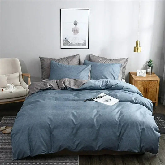 Blue and gray grain pattern duvet cover set with blue denim-like fabric and matching pillows with a gray accent pillow