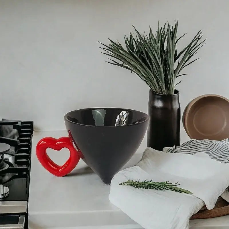 Black ceramic bowl with glossy finish and red heart shape ceramic handle from decorbites fruit juice mug set