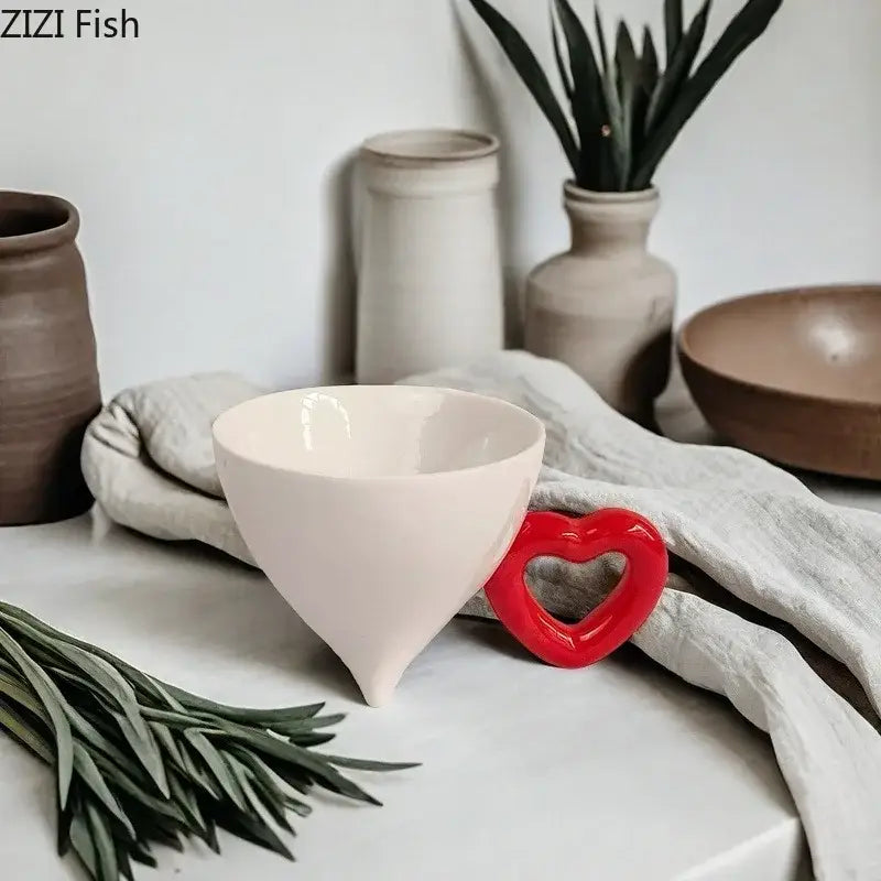 A cream-colored matte ceramic bowl with tapered design and smooth edges for decorbites heart shape ceramic fruit juice use