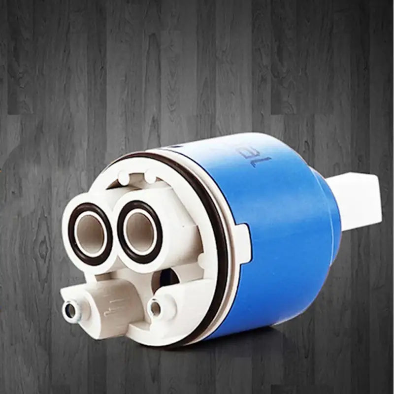 Blue and white 40mm ceramic faucet cartridge featuring black rubber seals for kitchen water saving applications
