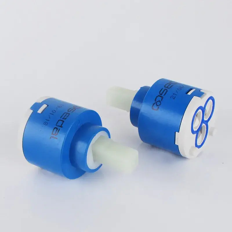 Blue and white ceramic cartridge faucet mixer with sleek modern design for kitchen spindle use
