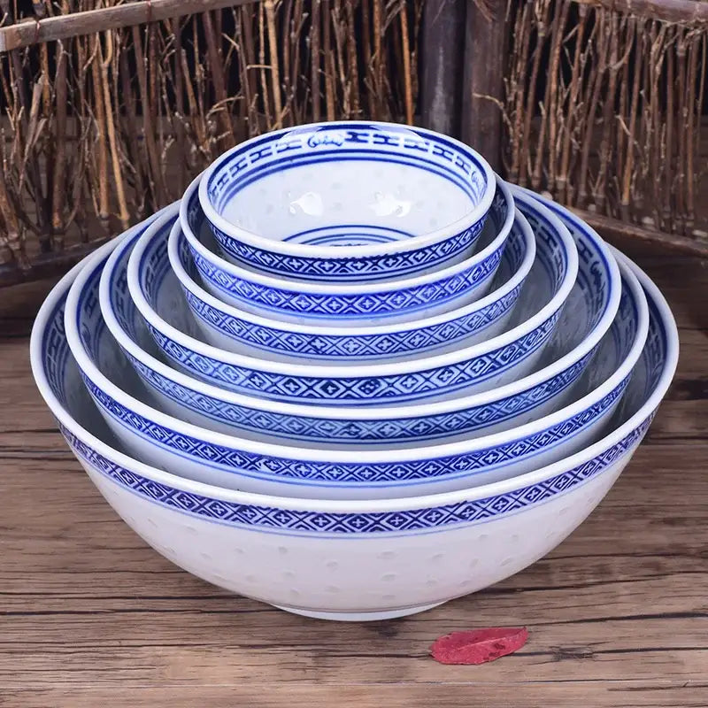 Set of five nested blue and white porcelain ramen bowls with intricate dragon pattern decorbites dragon pattern design