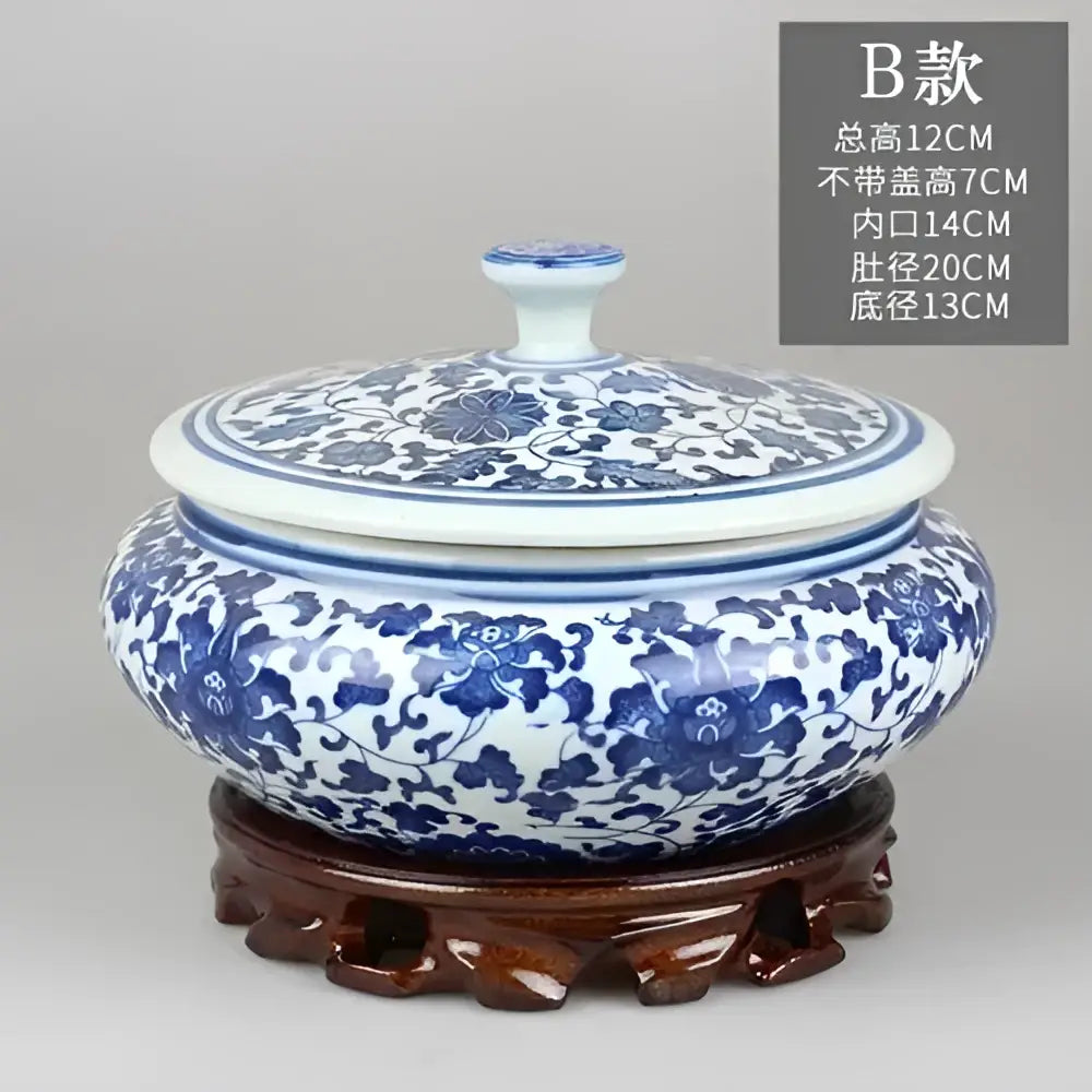 Blue and white floral ceramic tea caddy jar with intricate porcelain patterns for living room decor