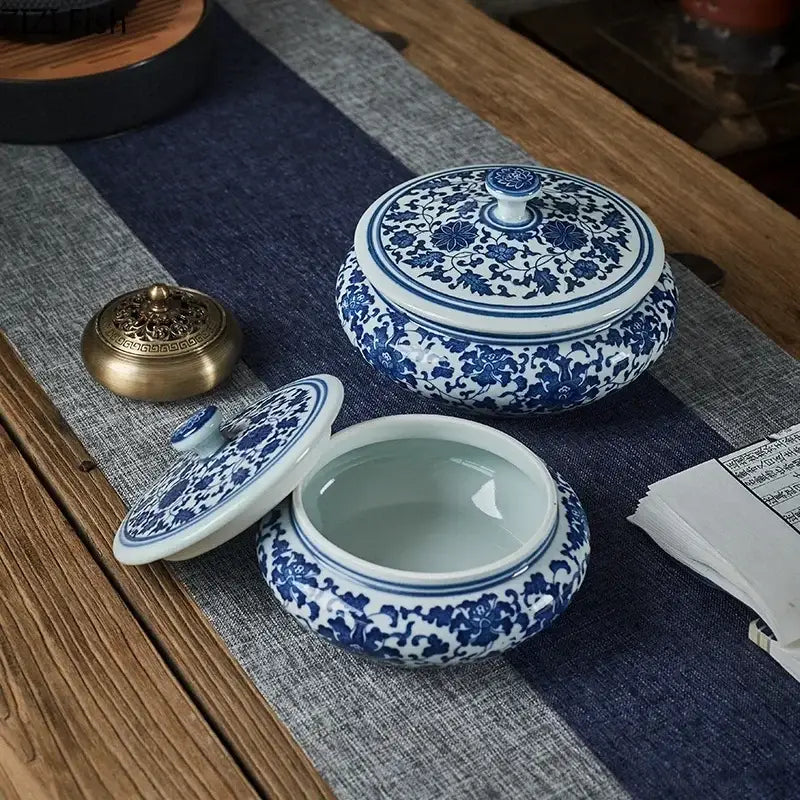 Blue and white floral ceramic tea caddy jar set with intricate patterns for living room decor