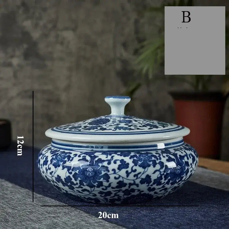Blue and white floral ceramic tea caddy jar with intricate patterns for elegant living room decor