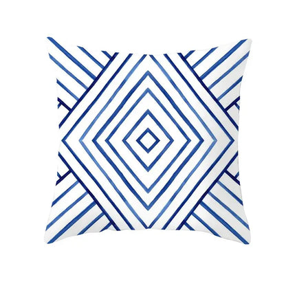 White throw pillow with blue geometric heart pattern featuring concentric diamond shapes for living room decorbites geometric heart round use
