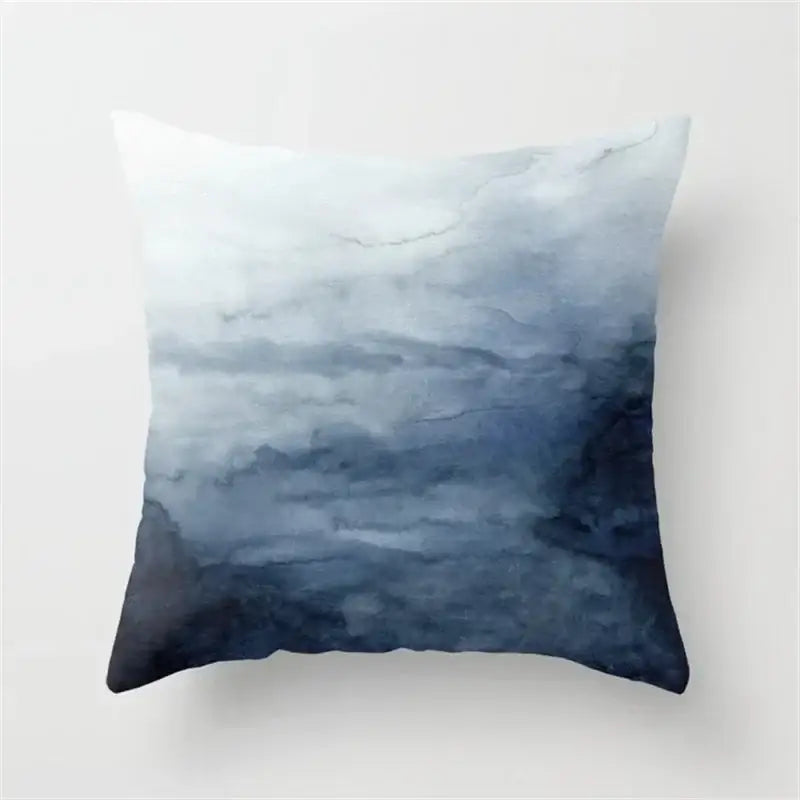 Blue and white geometric heart round cushion cover with soft blue watercolor gradient for living room decorbites geometric heart decor