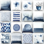 A collection of twelve blue and white geometric heart round throw pillows featuring decorbites geometric heart designs for living room decor