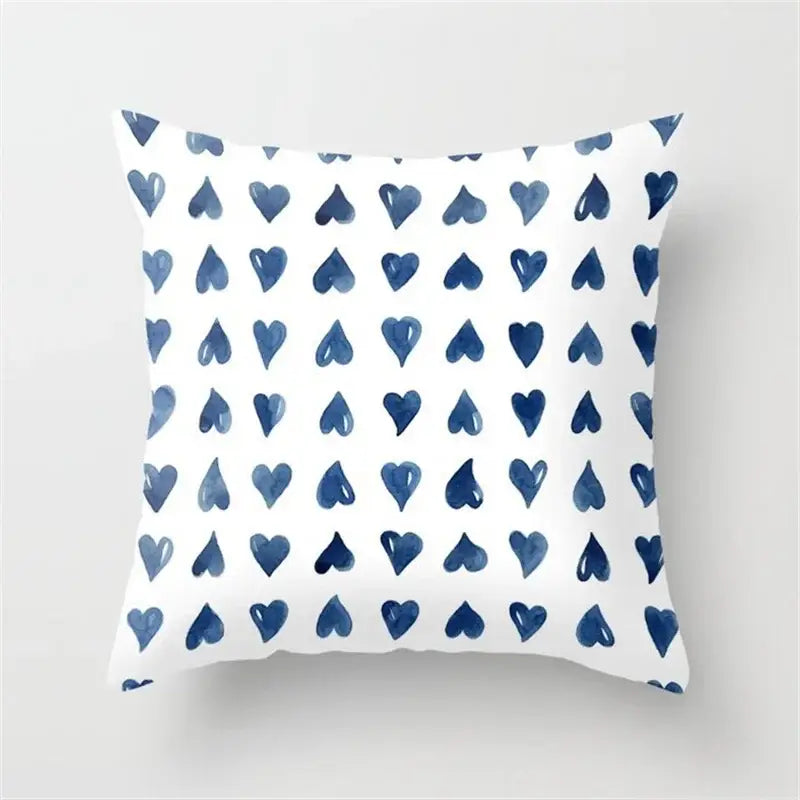 White throw pillow with navy blue geometric heart round pattern decorbites geometric heart living room decor