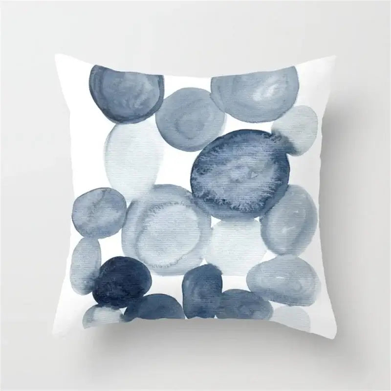 A square throw pillow with a blue and white geometric heart round watercolor design for living room decorbites geometric heart decor