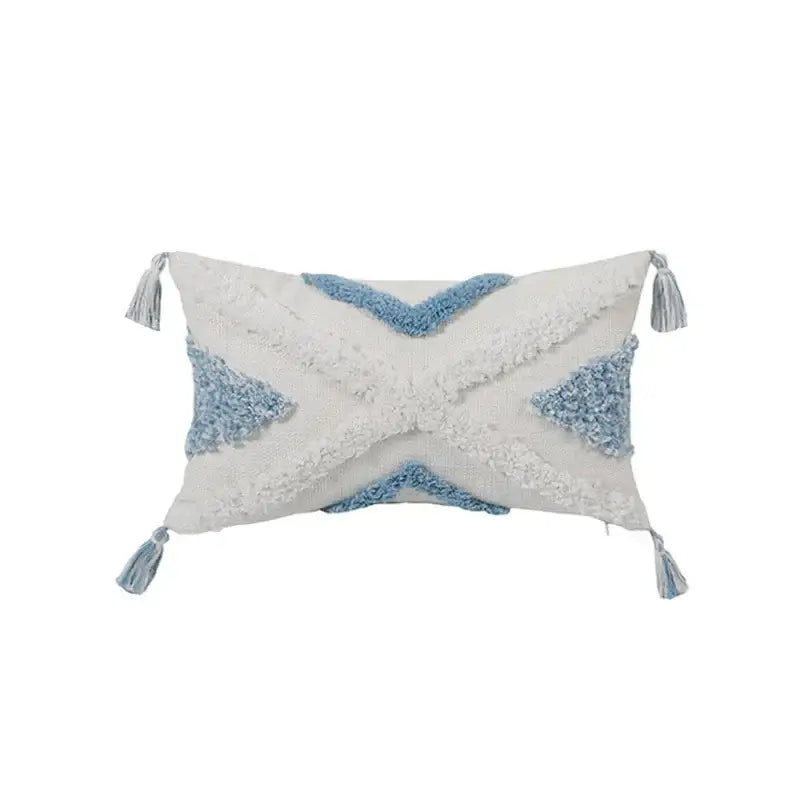 Rectangular white and light blue textured throw pillow with woven geometric pattern and tassels in blue geometric tufted pillowcase set