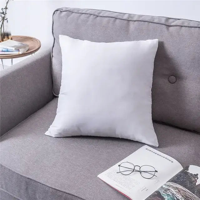 White square cushion with soft fabric texture on gray sofa in decorbites blue geometric tufted pillowcase set