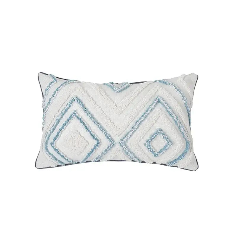 White rectangular pillow with blue geometric tufted patterns and cream textured frayed edges from decorbites pillowcase set