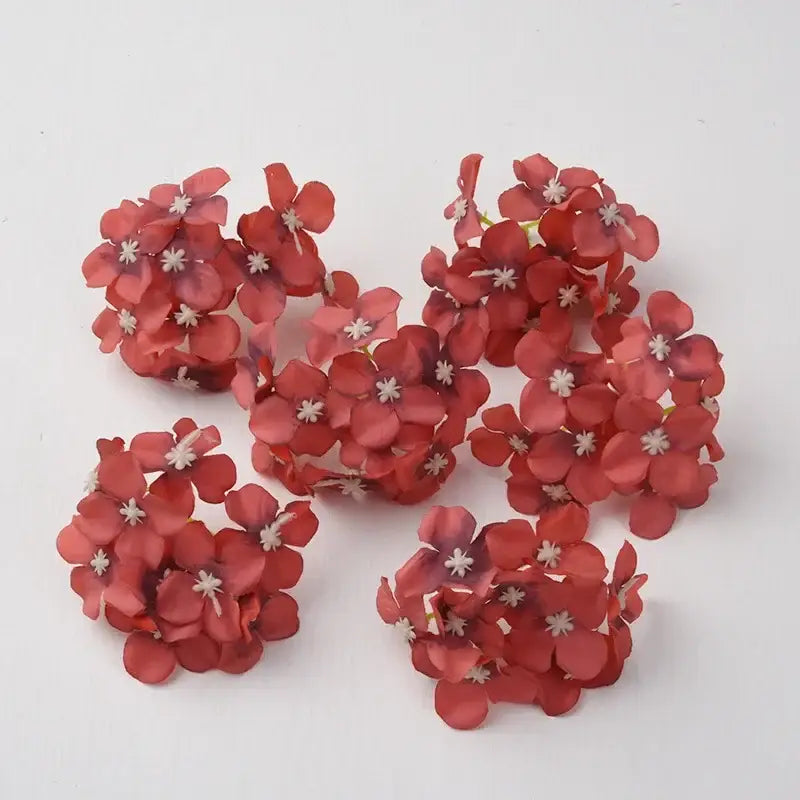 Clusters of artificial red hydrangea flowers with delicate white centers for decorbites hydrangea flowers wedding decor