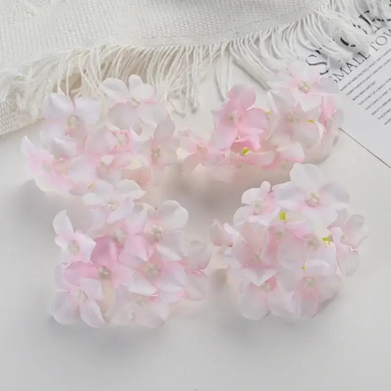 Delicate clusters of artificial pink and white hydrangea flowers with subtle yellow centers for decorbites hydrangea flowers wedding decor