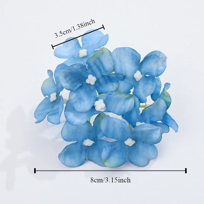 A cluster of decorbites hydrangea flowers in blue and white with delicate centers for wedding decor and living room use