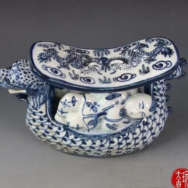 Blue and white porcelain dragon boat statue incense burner with intricate painted designs for bedroom decor