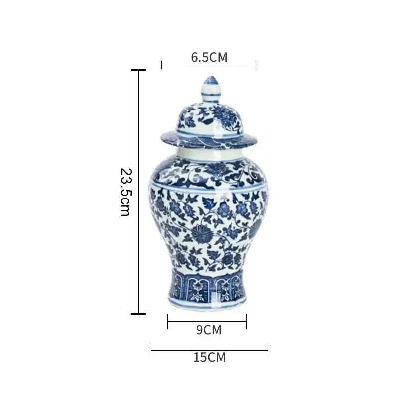 A classic blue white porcelain ginger jar with intricate floral patterns and matching lid for dining room storage