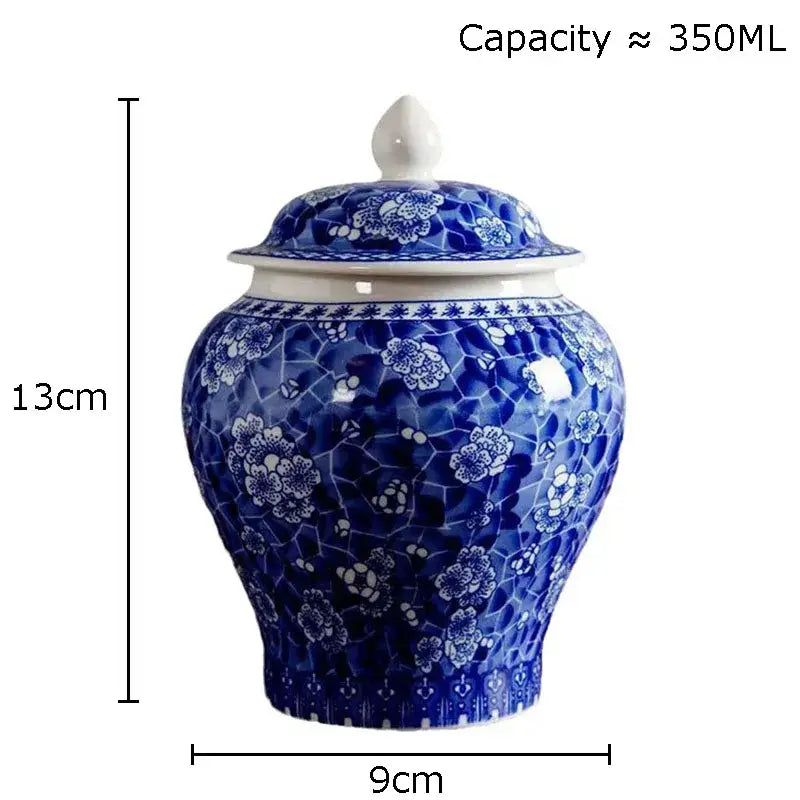 A blue and white porcelain general jar tea canister with floral mosaic pattern and matching lid for dining room decor