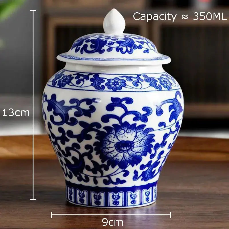Blue and white porcelain general jar tea canister with intricate floral patterns and matching lid for dining room decor
