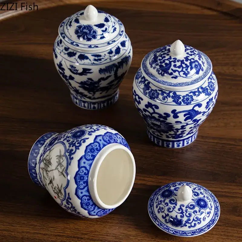 Blue and white porcelain general jar tea canister with intricate floral patterns and matching lids for dining room decor