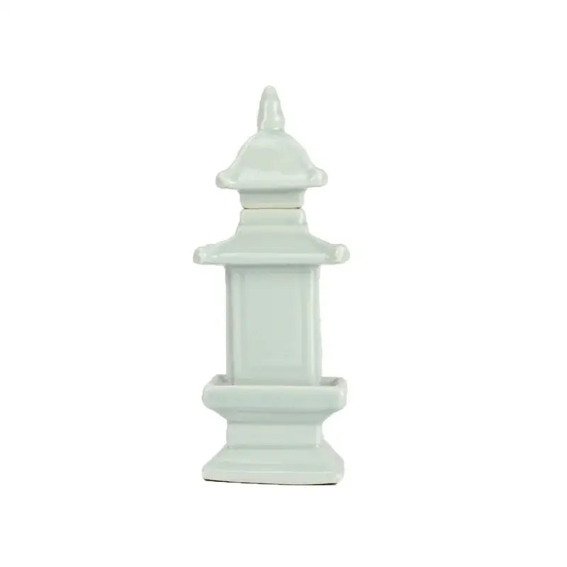 A pale green porcelain layered ceramic pagoda lantern with smooth glaze for living room decor