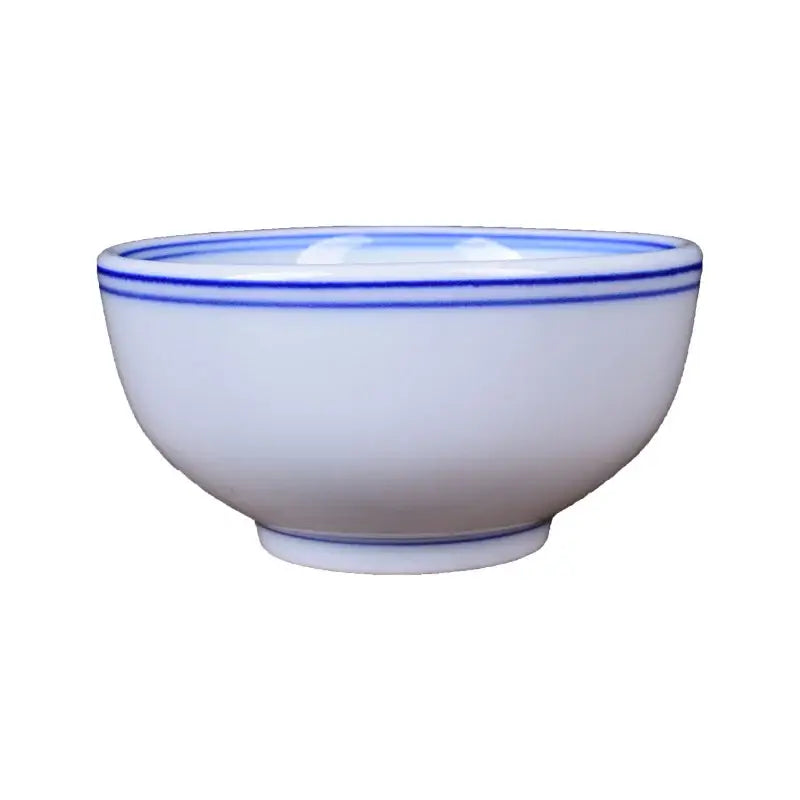White porcelain rice bowl with two thin blue decorative lines near the rim for dining room use