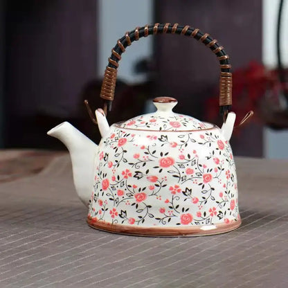White porcelain teapot with pink floral pattern and bamboo handle from decorbites blue porcelain set for dining room
