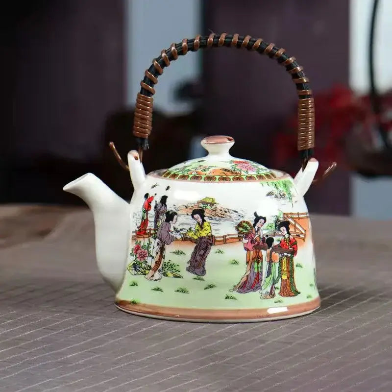 White porcelain teapot with hand-painted traditional figures and woven handle in decorbites blue porcelain set