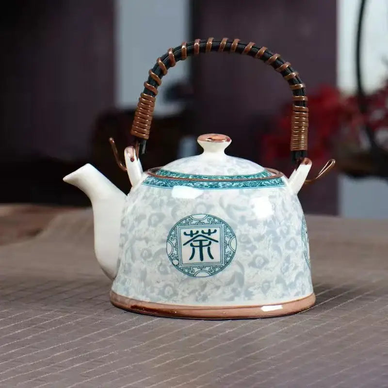 White porcelain teapot with blue floral pattern and chinese tea character from decorbites blue porcelain set