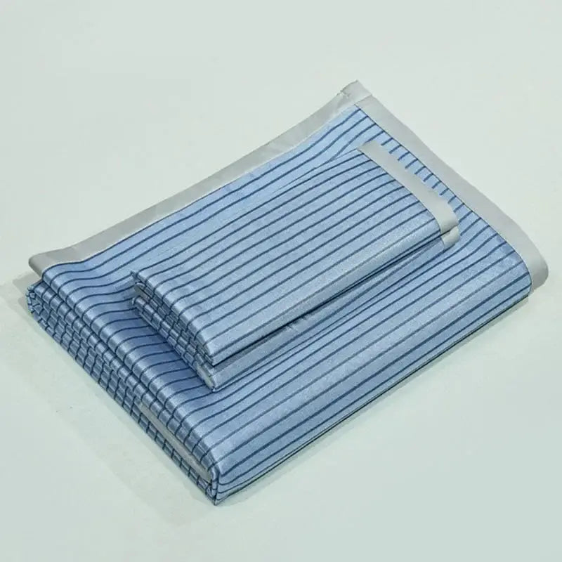 Blue and white striped satin cooling bed mat set with gray trim from decorbites cooling bed collection