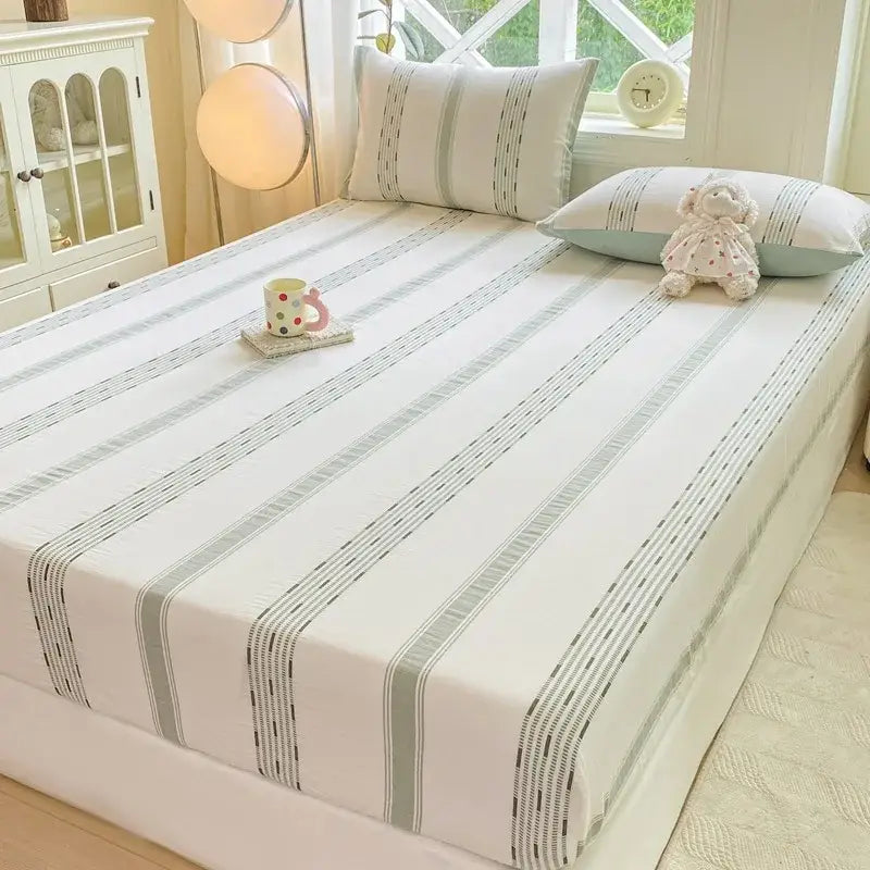Blue and white striped cotton jacquard fitted sheet set featuring white bed sheet with gray and black striped patterns
